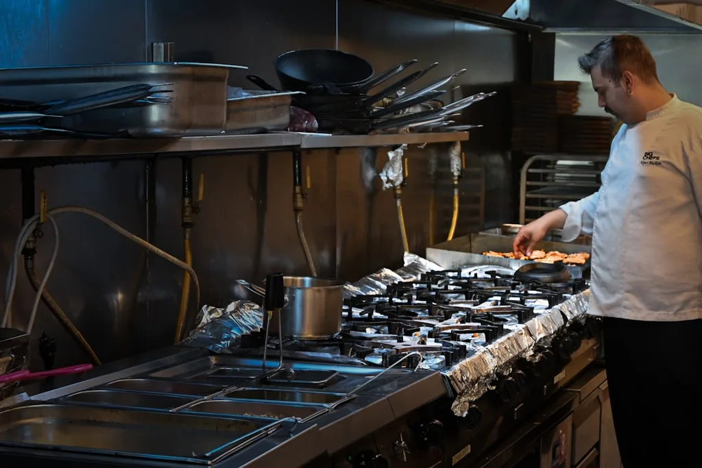 Professional catering preparation showing careful attention to food presentation