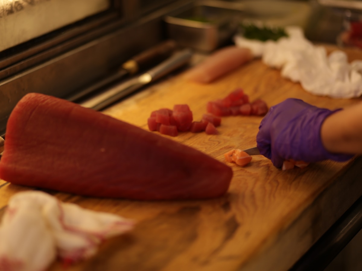 Chef preparing food with care and precision
